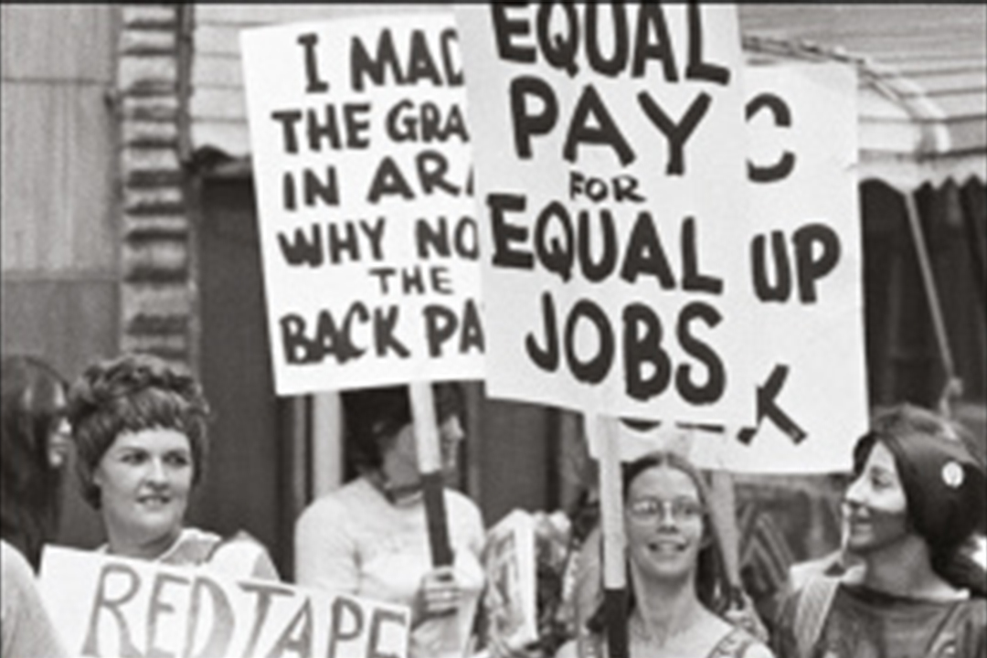 Section of book cover showing women holding placards